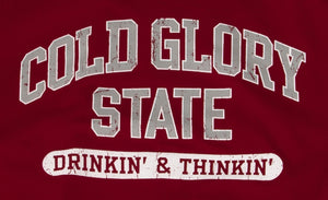 Close-up of Cardinal or Crimson Red and Grey Collegiate Varsity T-shirt. Distressed printing of college or University name and Drinking and Thinking sport.